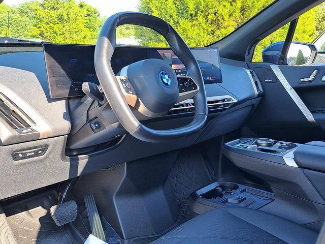 Used 2025 Blue BMW xDrive50 image 8