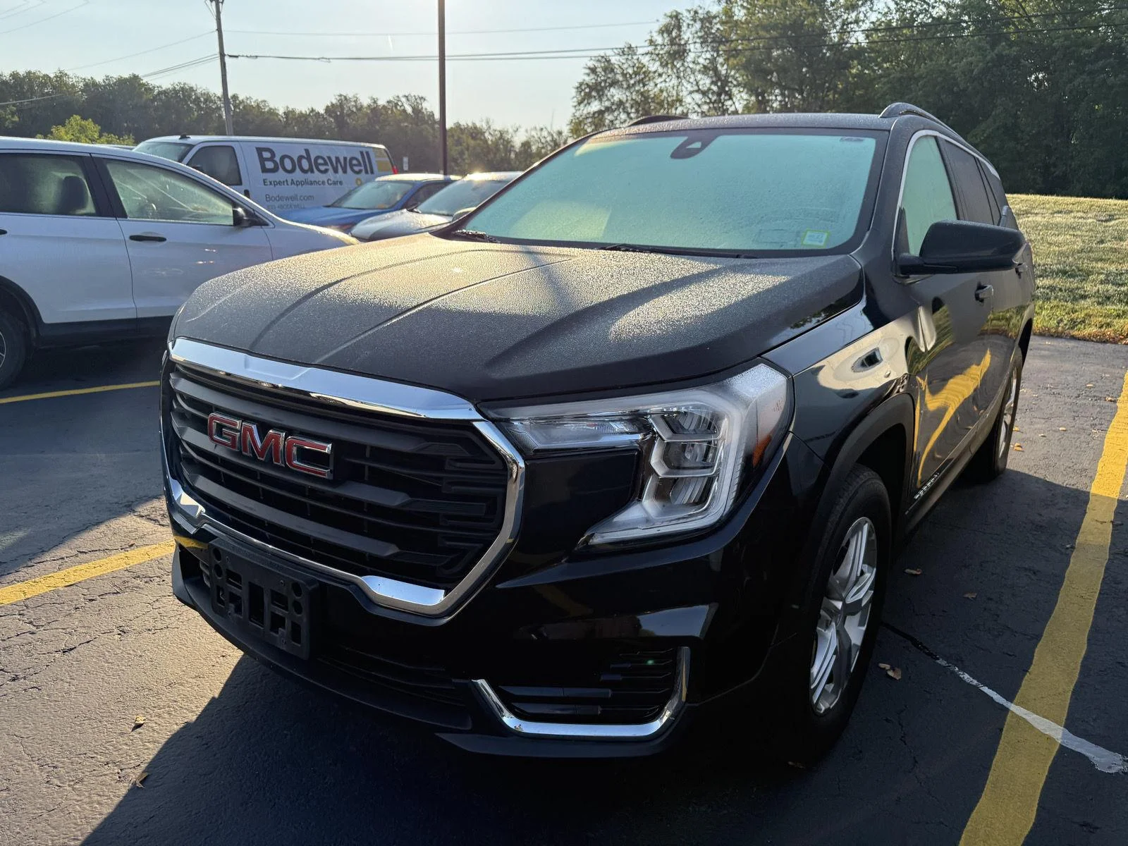 Used 2023 EBONY TWILIGHT METALLIC GMC SLE image 3