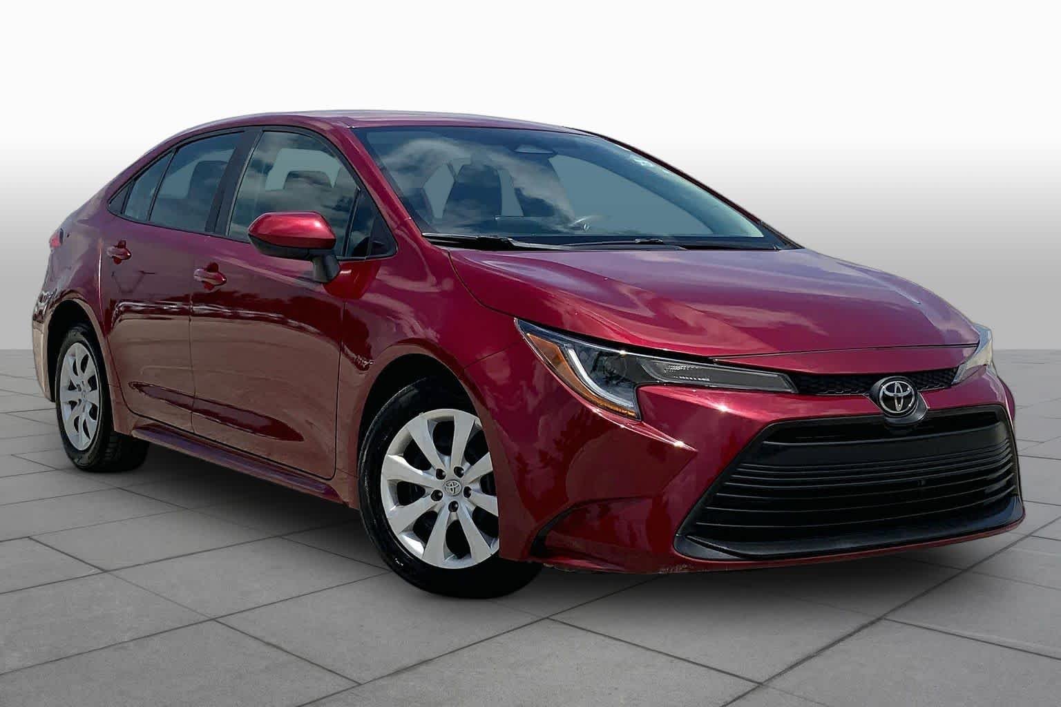Used 2024 Ruby Flare Pearl Toyota LE image 3