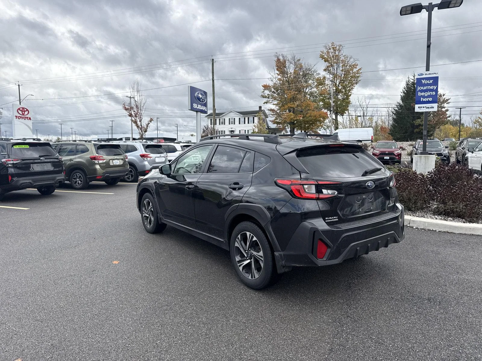 Used 2024 Crystal Black Silica Subaru Premium image 6