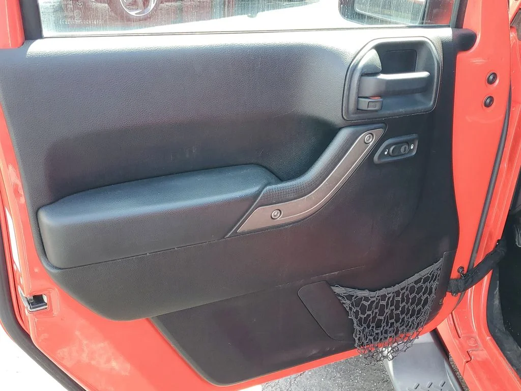 Used 2013 Red Jeep Unlimited Sport image 16