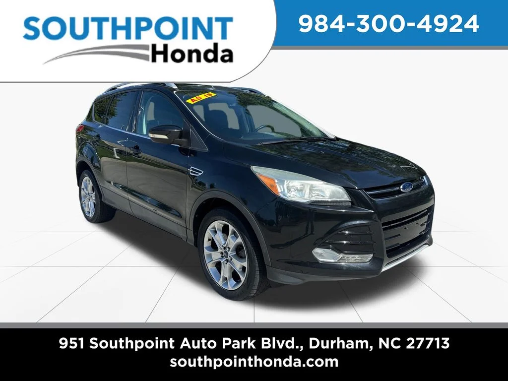 Used 2014 Tuxedo Black Ford Titanium image 1