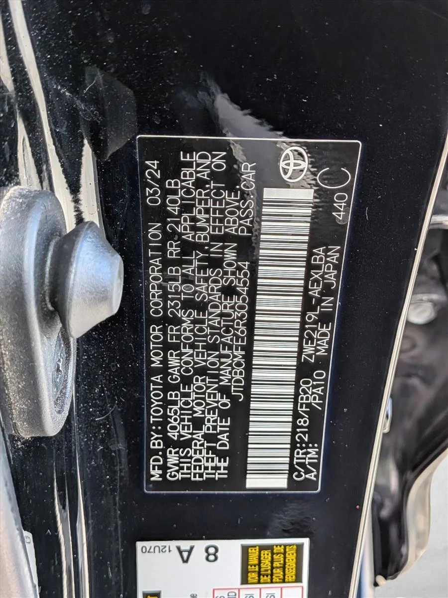 Used 2024 Midnight Black Metallic Toyota Hybrid LE image 24