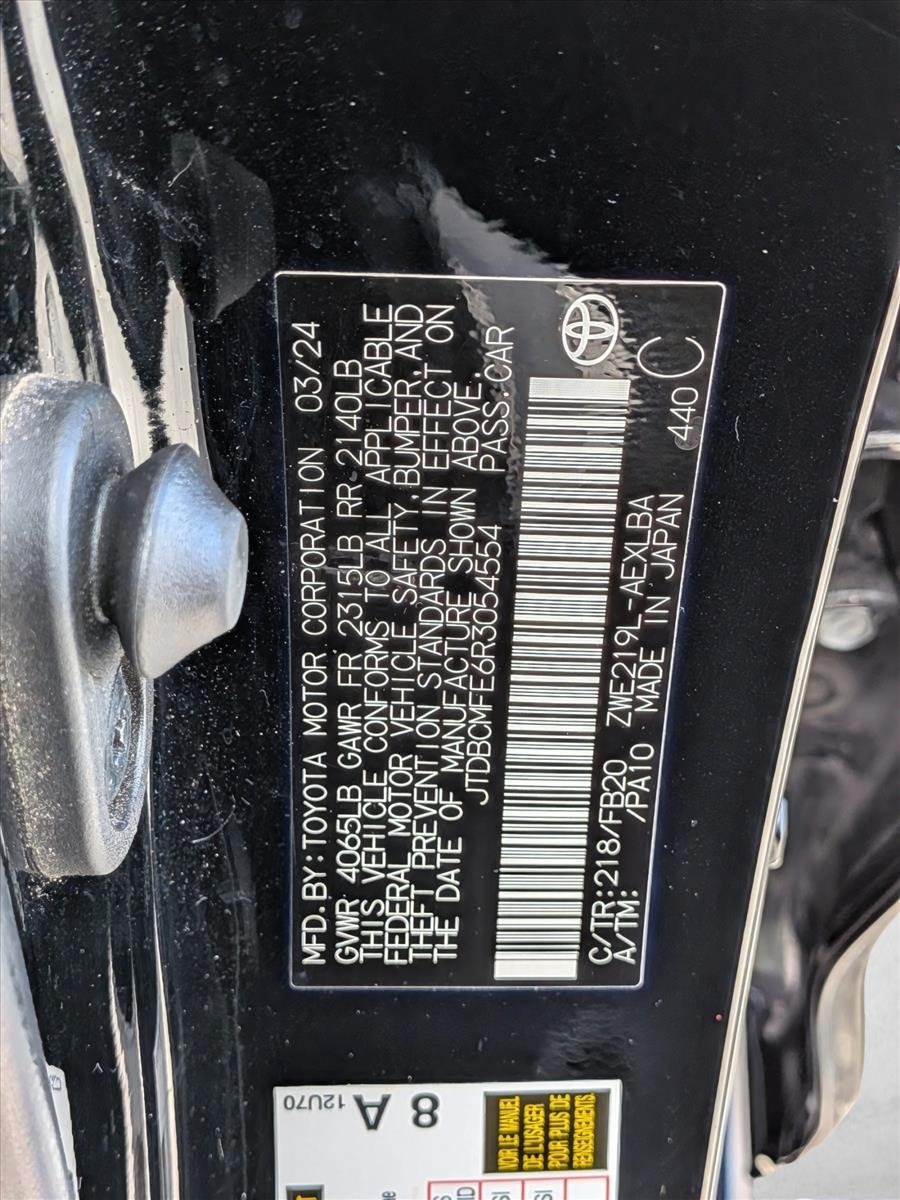 Used 2024 Midnight Black Metallic Toyota Hybrid LE image 24