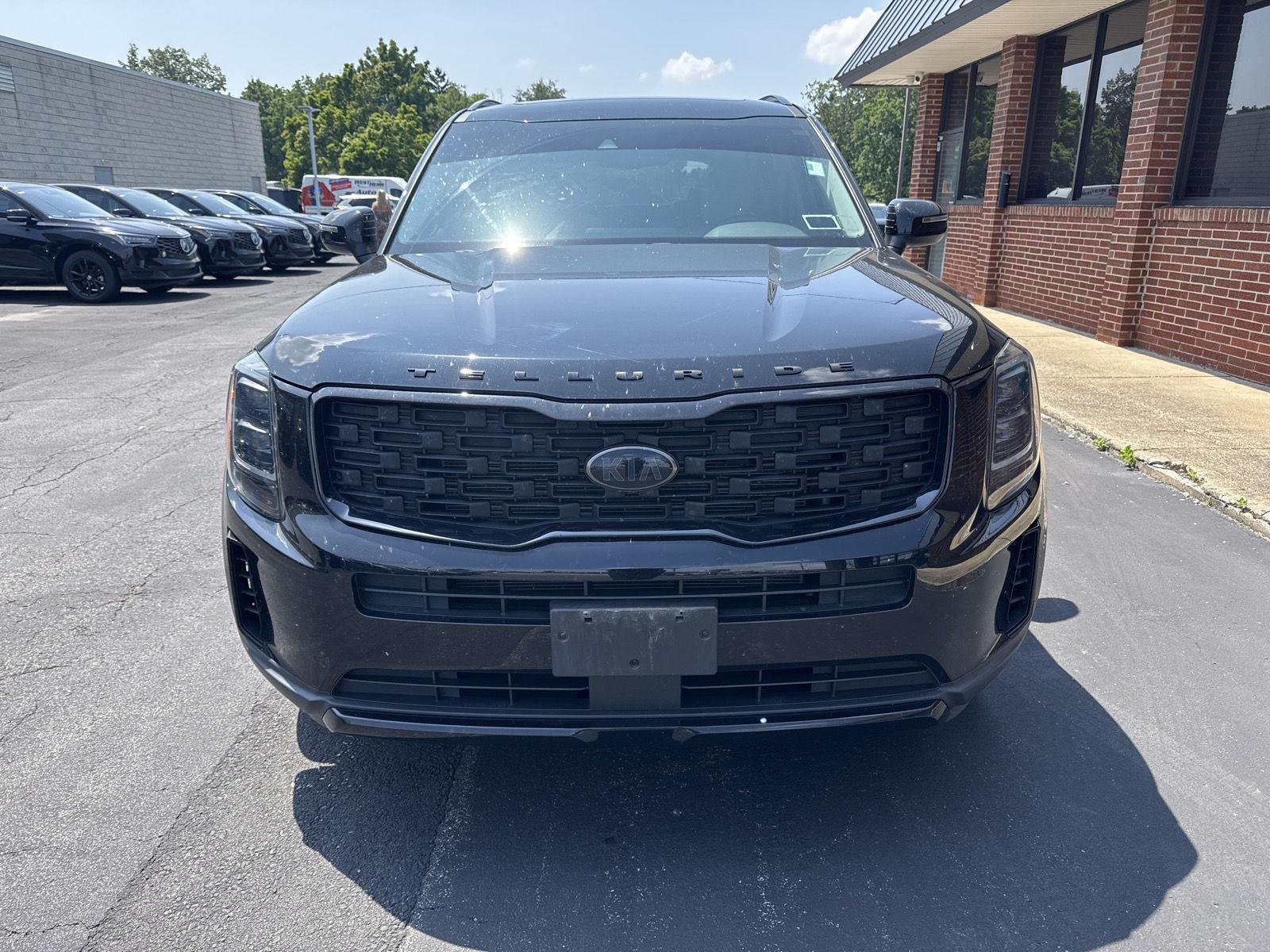 Used 2021 Ebony Black Kia EX image 2