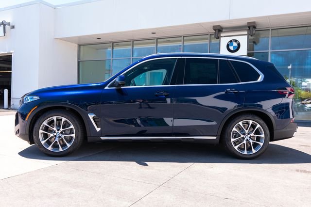 New 2026 Tanzanite Blue II Metallic BMW xDrive50e image 2