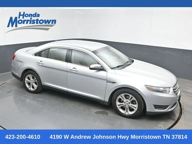 Used 2013 Ingot Silver Ford SEL image 1