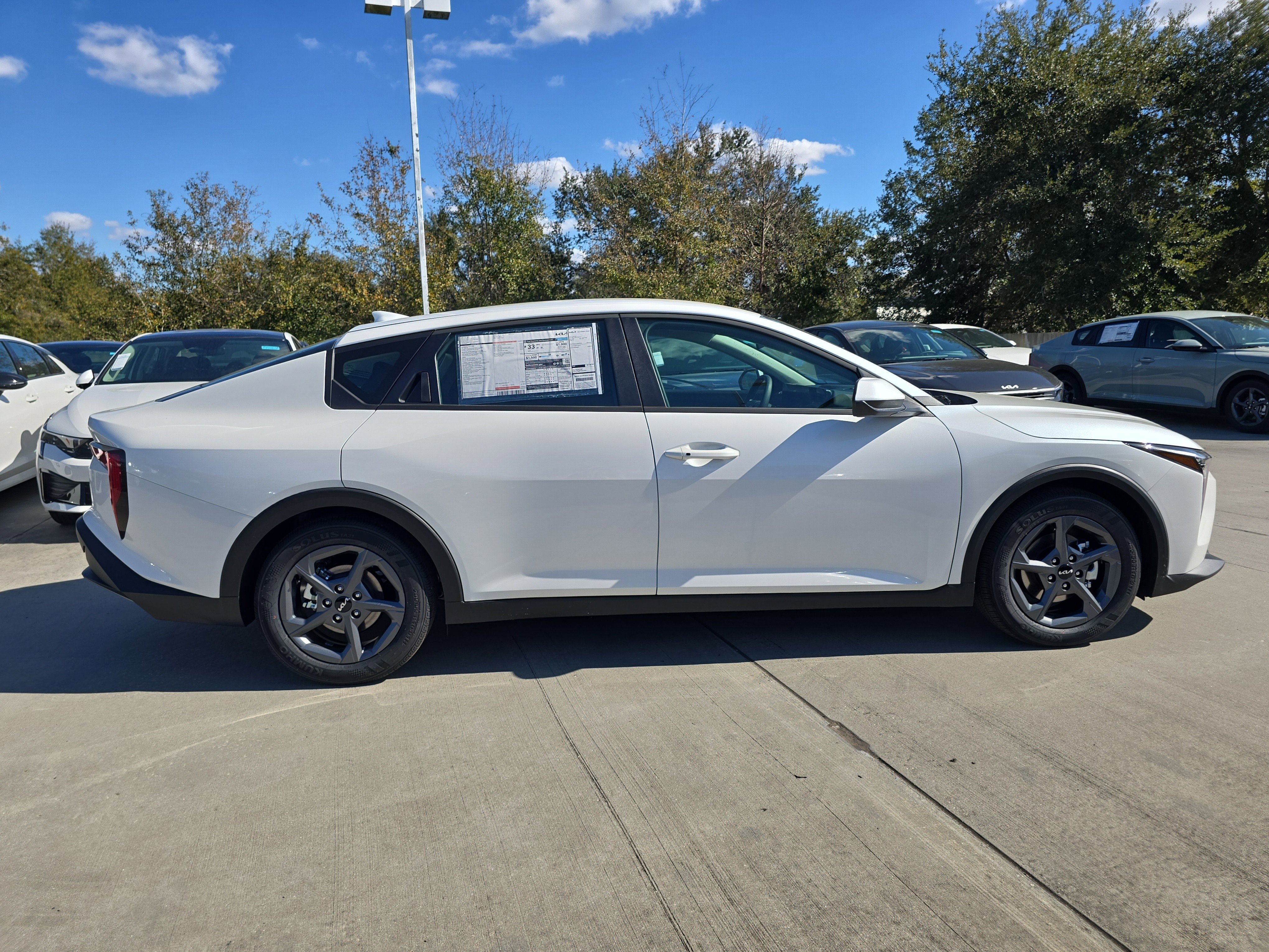New 2026 Snow White Pearl Kia LXS image 9