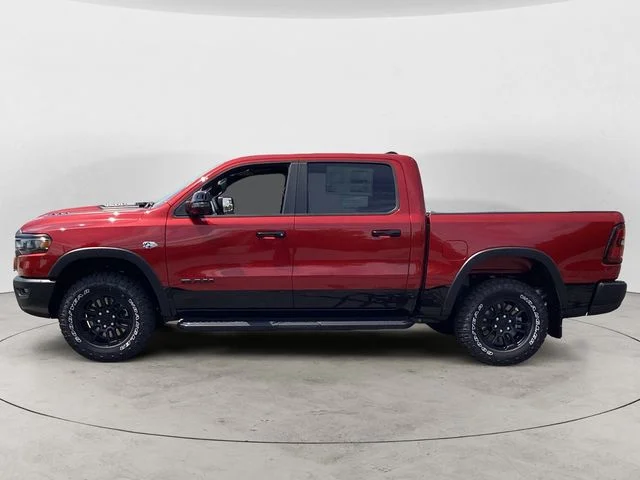 New 2026 Molten Red Ram REBEL CREW CAB 4X4 5