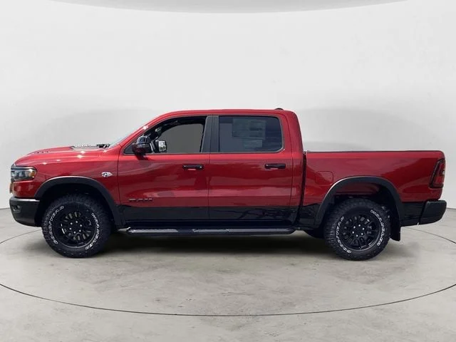 New 2026 Molten Red Ram REBEL CREW CAB 4X4 5