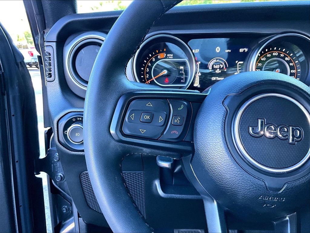 Used 2023 Granite Crystal Metallic Clearcoat Jeep Sport S image 23