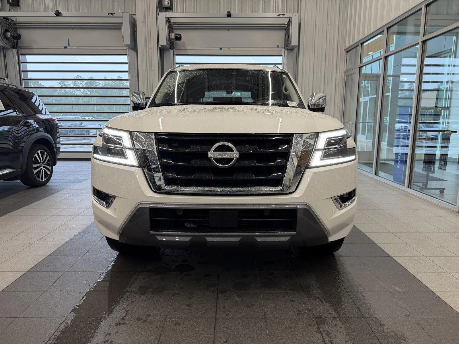 Used 2024 Aspen White Tricoat Nissan Platinum image 2