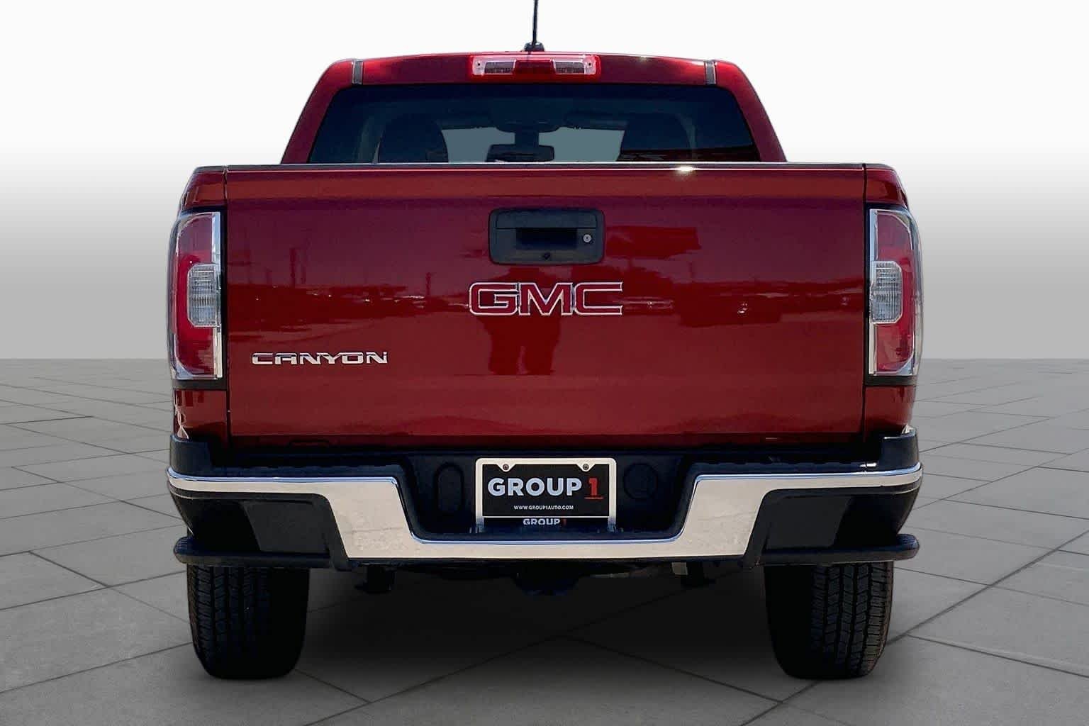 Used 2016 Copper Red Metallic GMC 2WD image 4