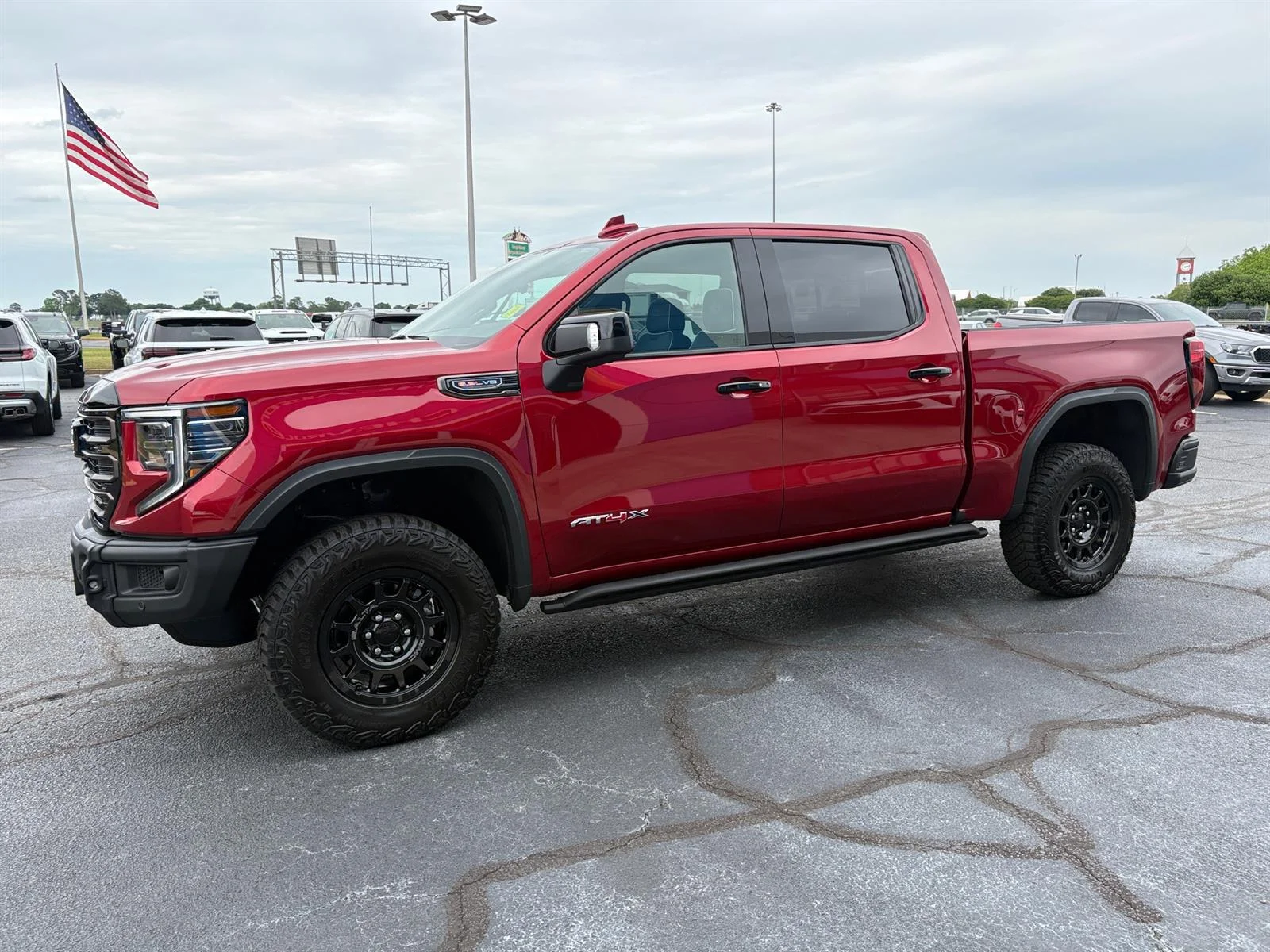 Used 2026 Volcanic Red Tintcoat GMC AT4X image 18