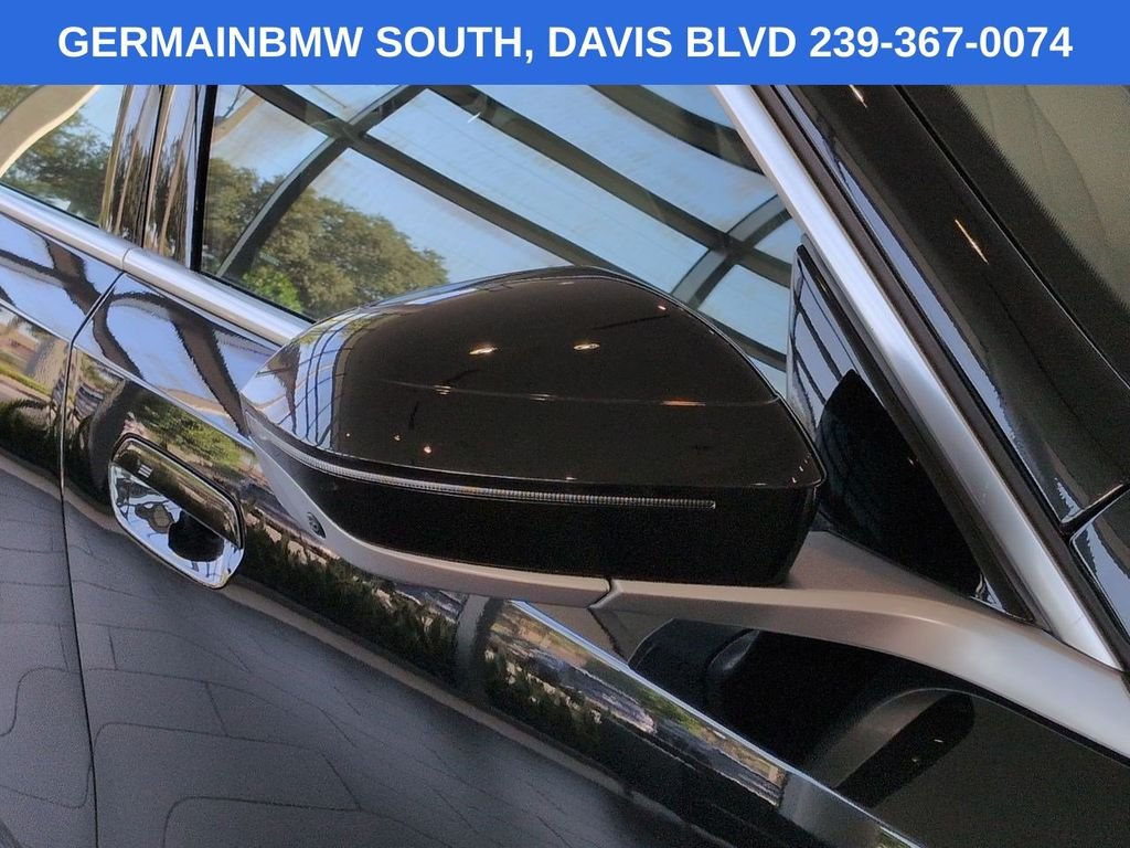 Used 2026 Black Sapphire Metallic BMW eDrive40 image 13