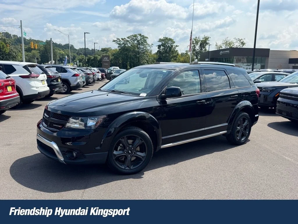 Used 2018 Black Dodge Crossroad image 1