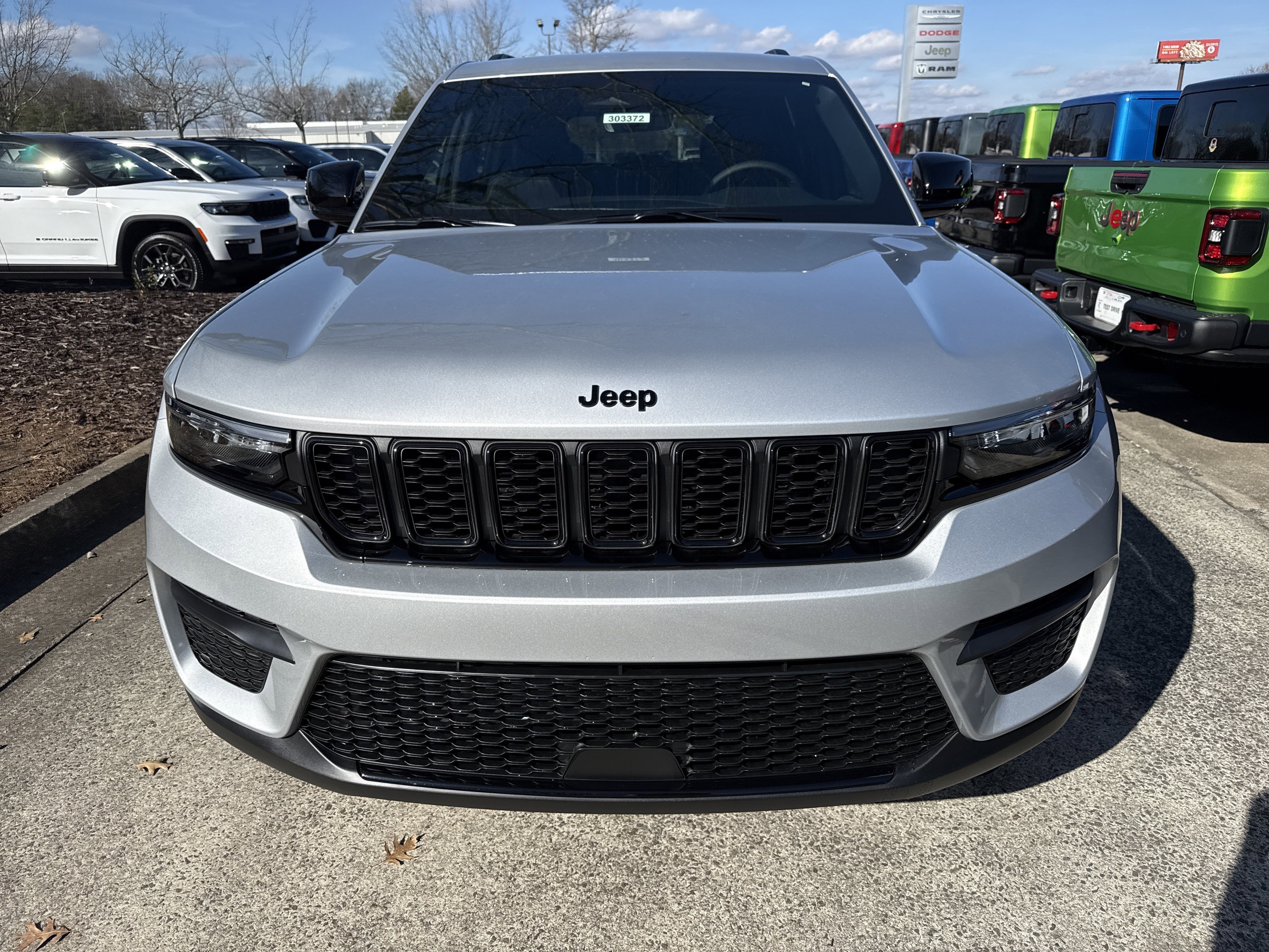 New 2025 Silver Zynith Jeep Altitude image 2