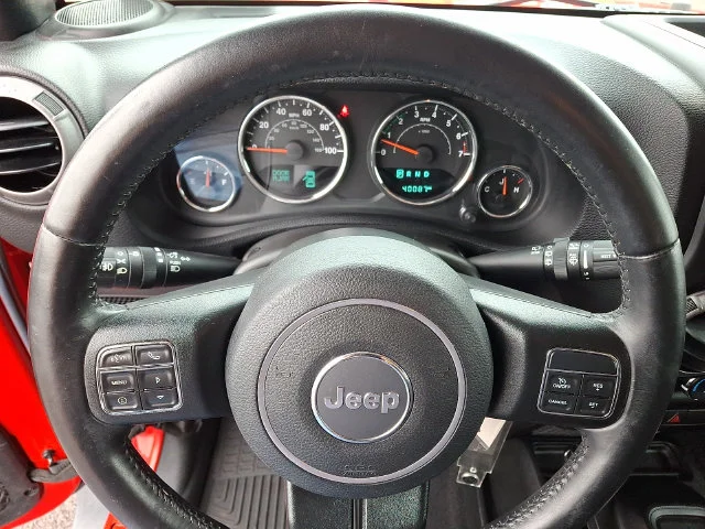 Used 2016 Red Jeep Unlimited Sport image 17