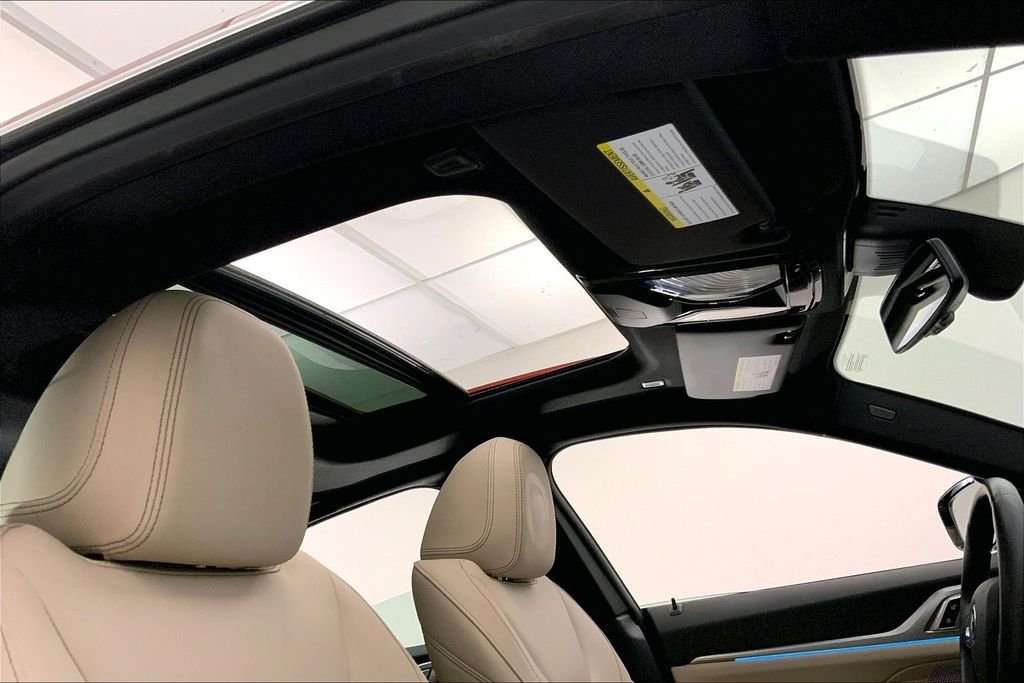 Used 2023 Sunset Orange Metallic BMW  image 25