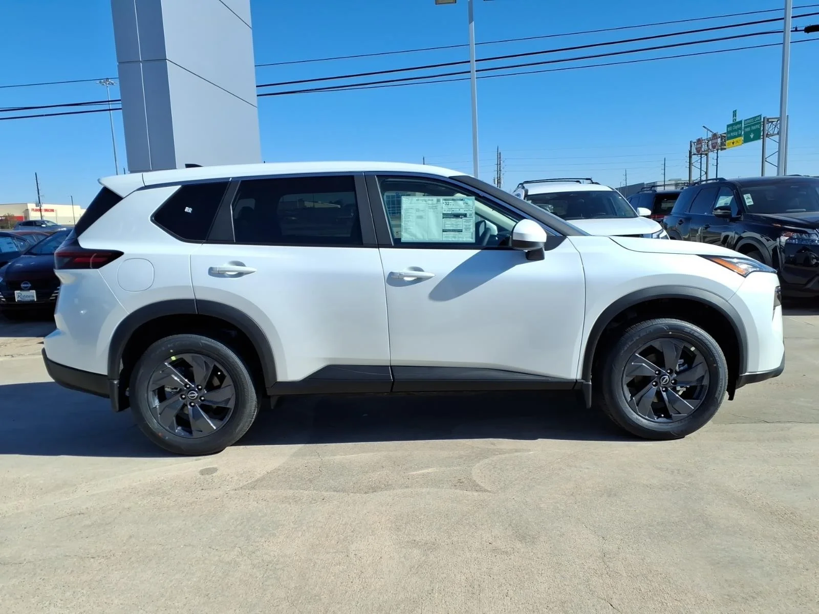 2026 Nissan Rogue SV White at Robbins Nissan