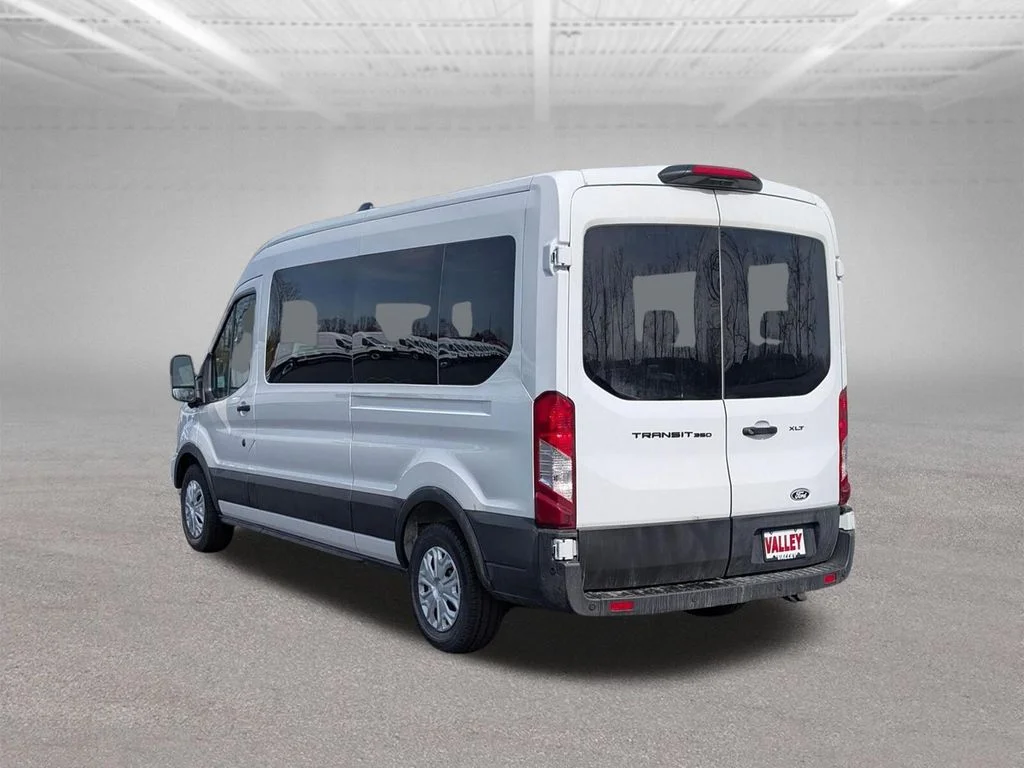 New 2026 Oxford White Ford Passenger Van XLT image 9