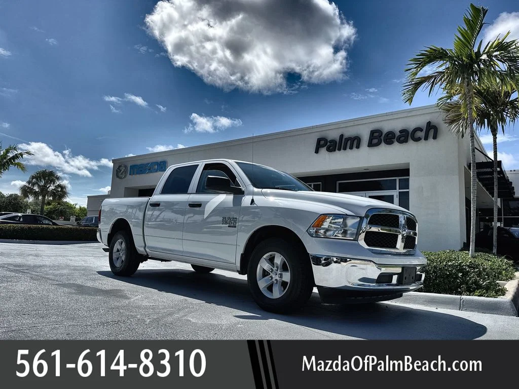 Used 2022 Bright White Clearcoat Ram SLT image 1