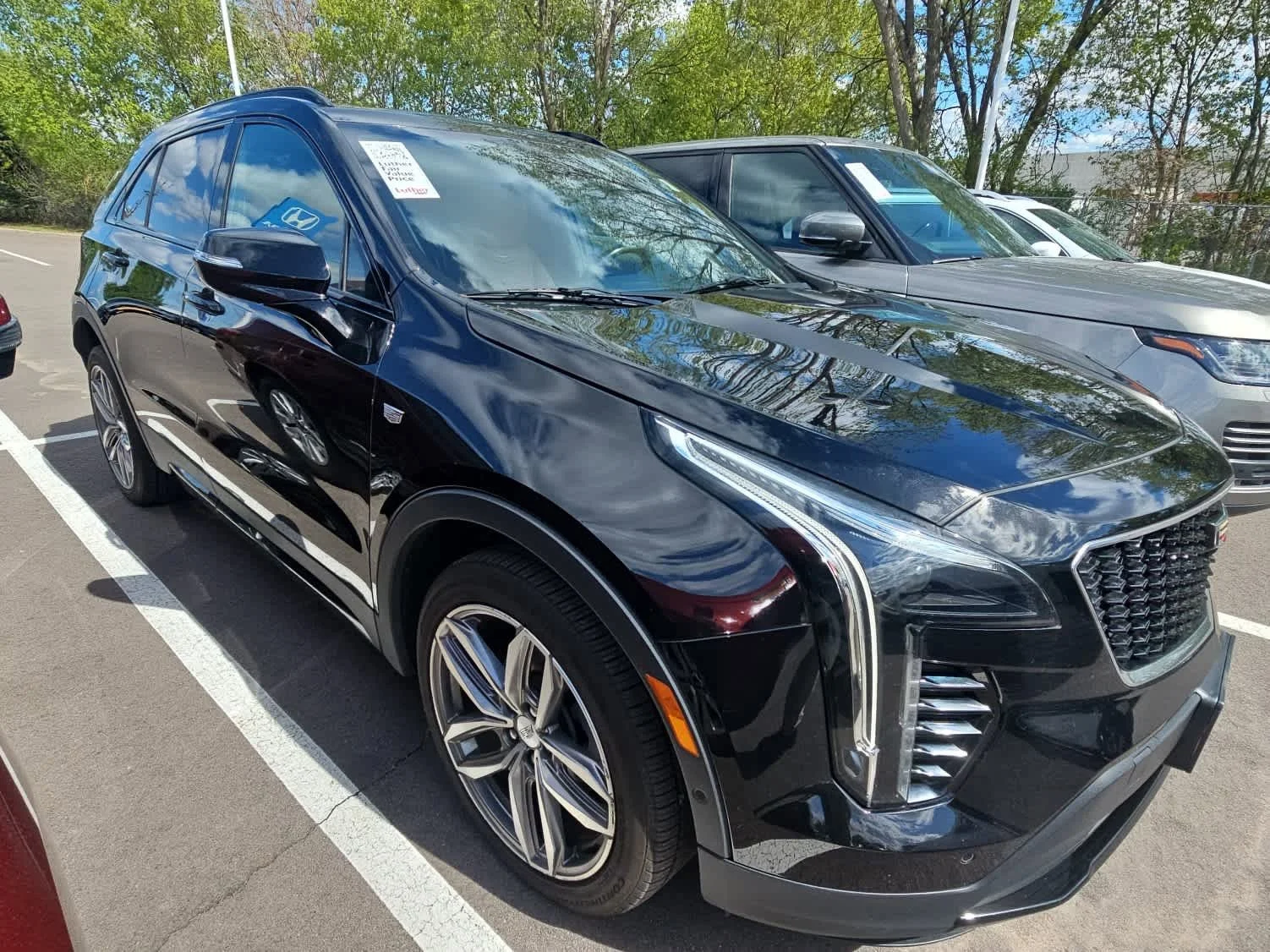 Used 2020 Cadillac XT4 Sport with VIN 1GYFZFR44LF021406 for sale in Hopkins, Minnesota