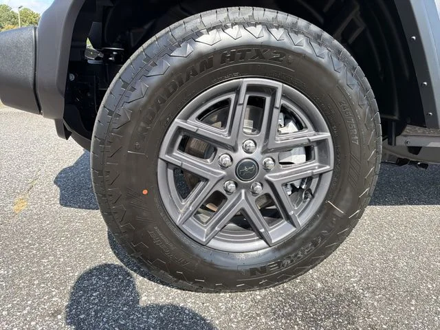 New 2026 Granite Crystal Metallic Clear-Coat Exterior Paint Jeep Sport S image 11