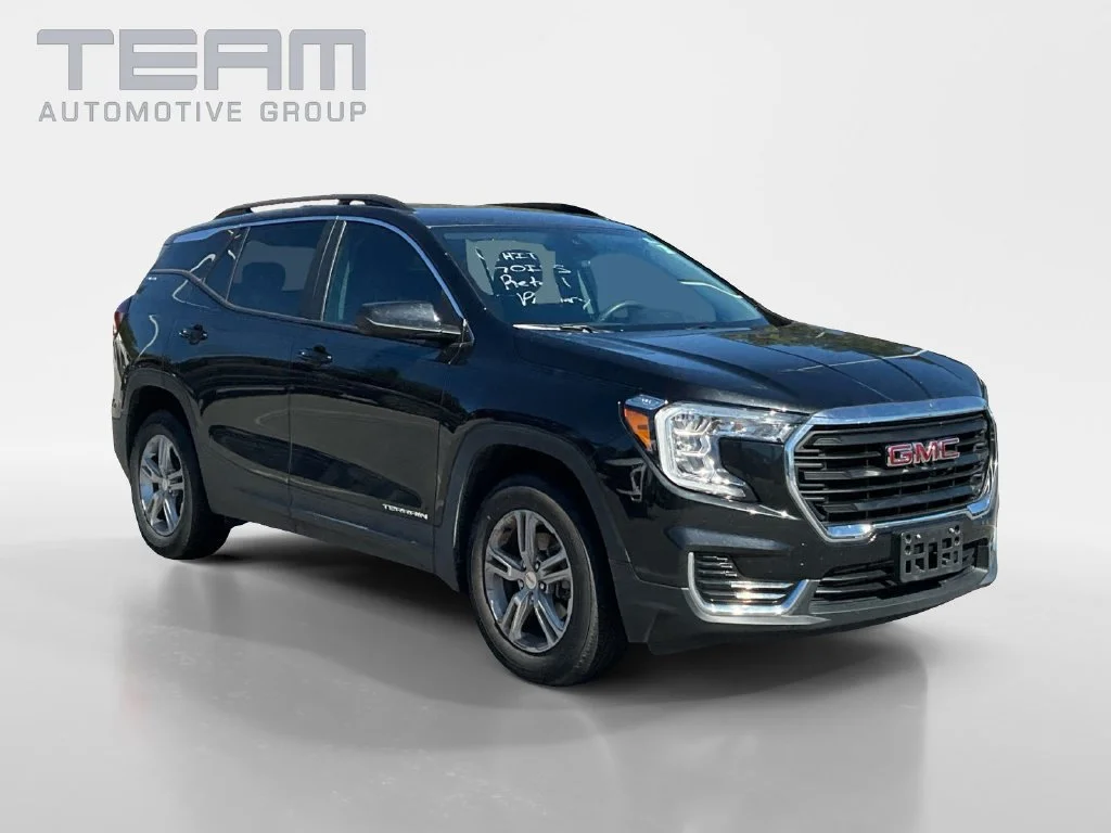 Used 2023 EBONY TWILIGHT METALLIC GMC SLE image 1