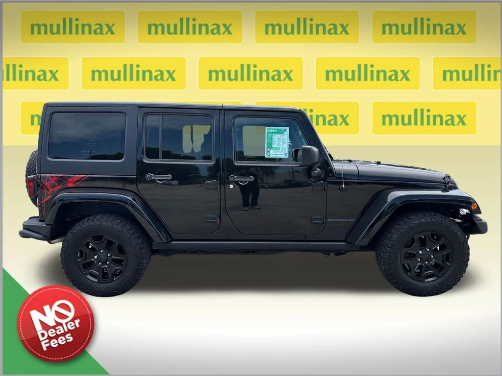 Used 2016 Black Jeep Unlimited Sahara image 2