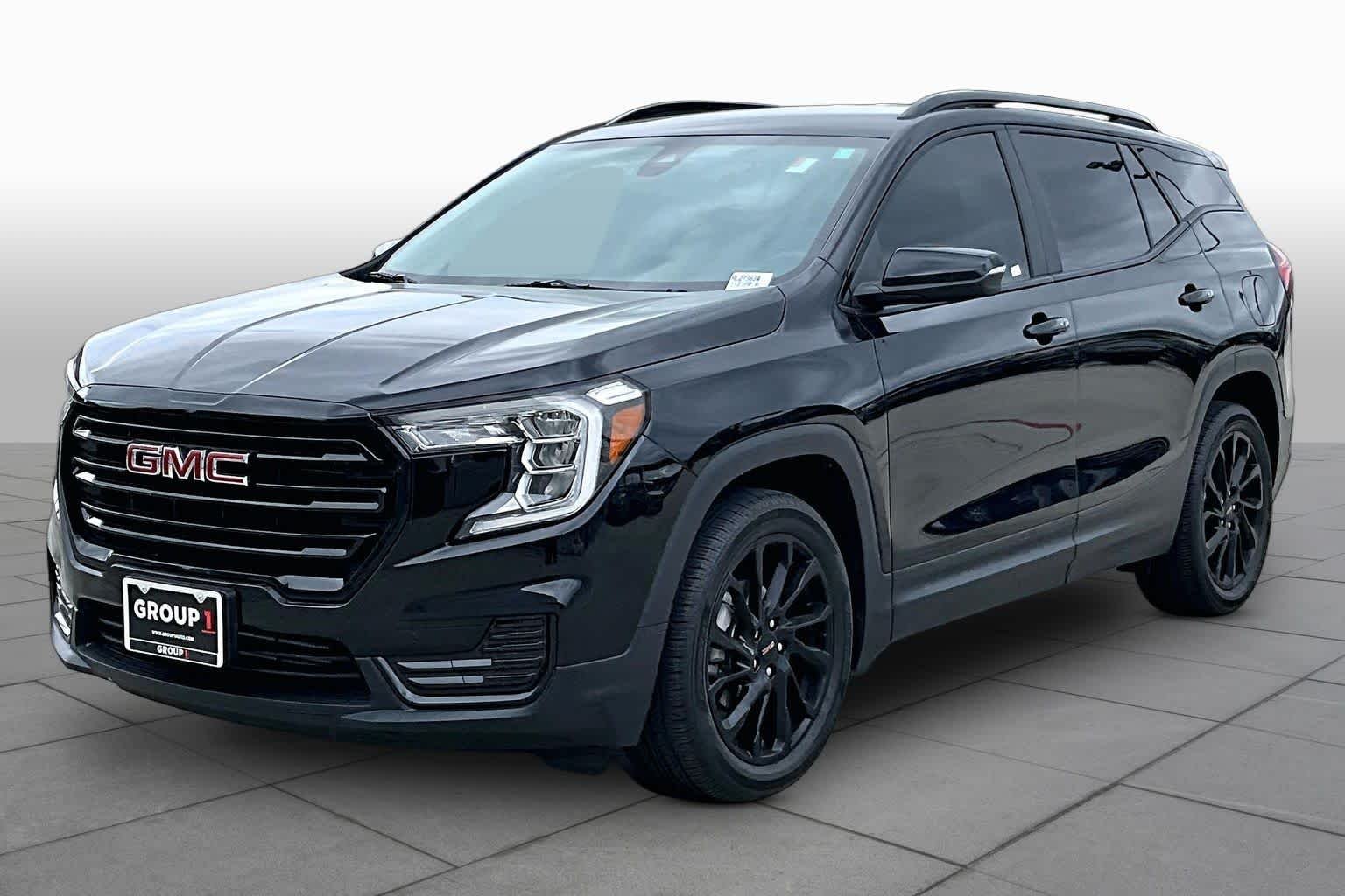 Used 2024 Ebony Twilight Metallic GMC SLE image 2