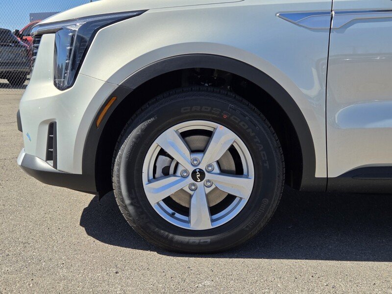New 2026 Ivory Silver Kia LX image 5