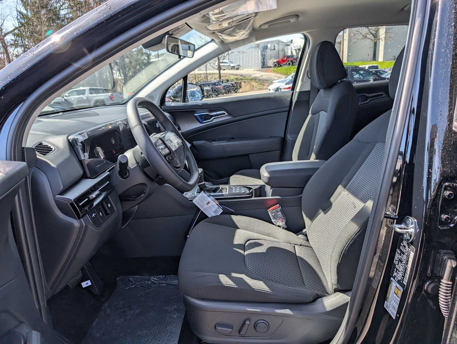 New 2026 Ebony Black Kia LX image 4