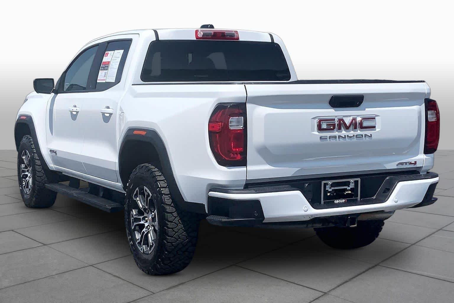 Used 2024 Summit White GMC 4WD AT4 image 24
