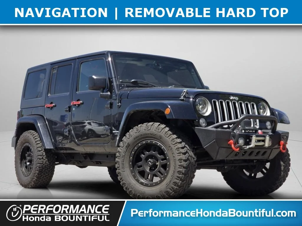 Used 2018 Black Clearcoat Jeep Sahara image 1