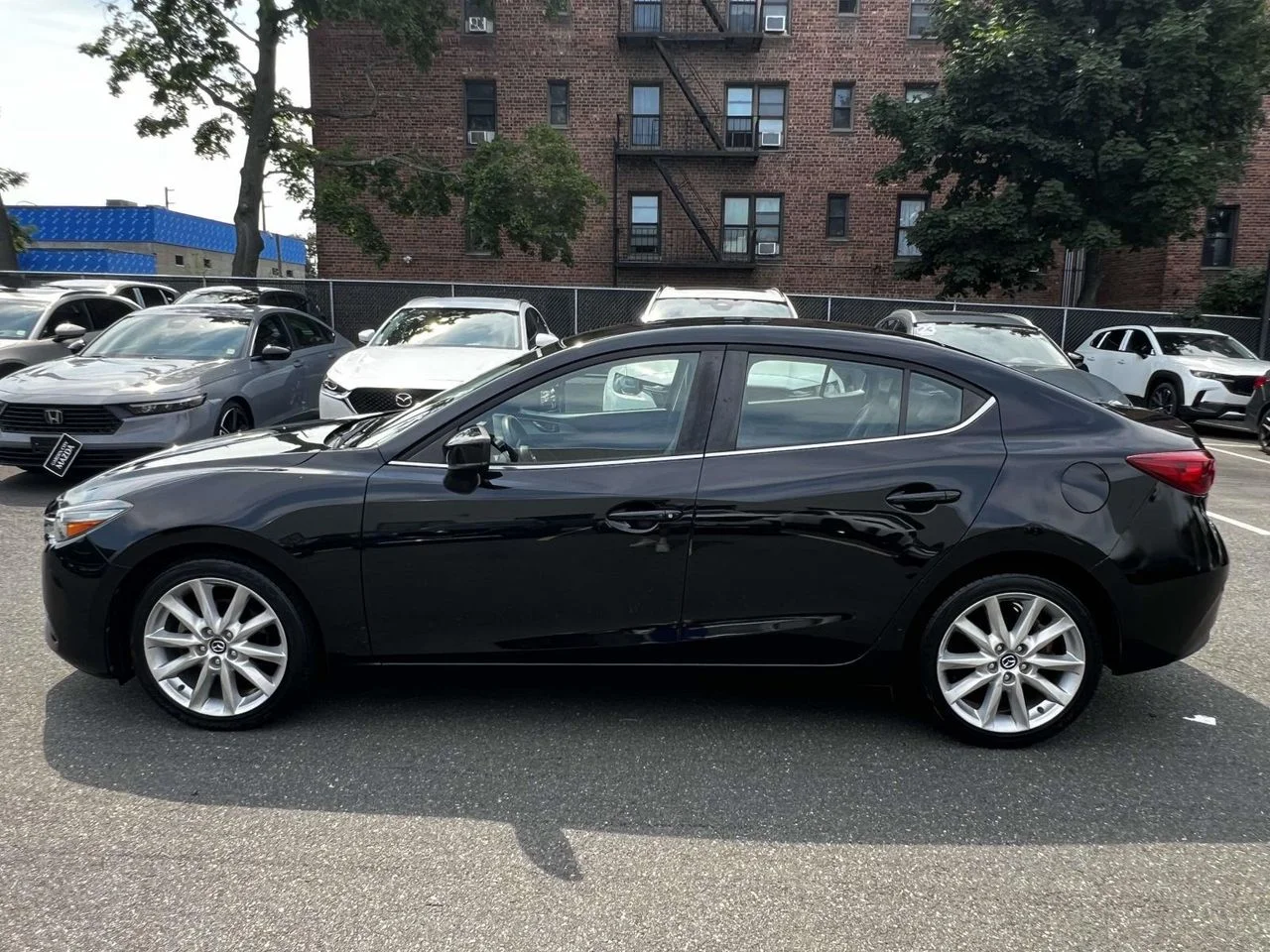 Used 2017 Jet Black Mica Mazda Touring image 4