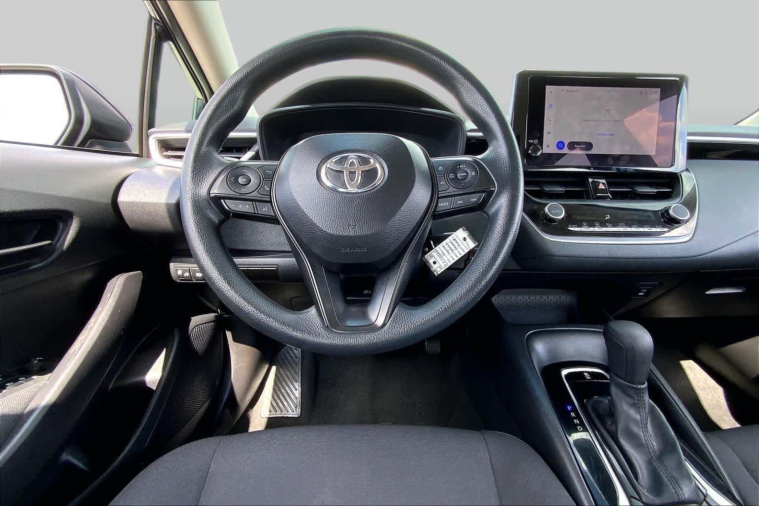 Used 2024 Midnight Black Metallic Toyota LE image 6