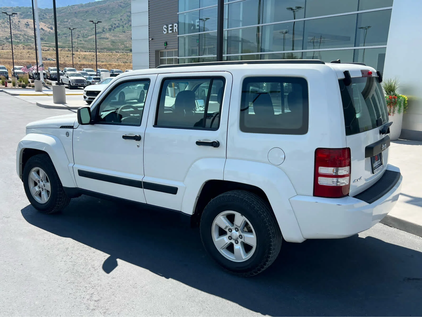 Used 2010 Stone White Clearcoat Jeep Sport image 11