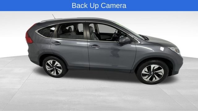 Used 2015 Honda CR-V Touring with VIN 5J6RM4H93FL132838 for sale in Janesville, WI
