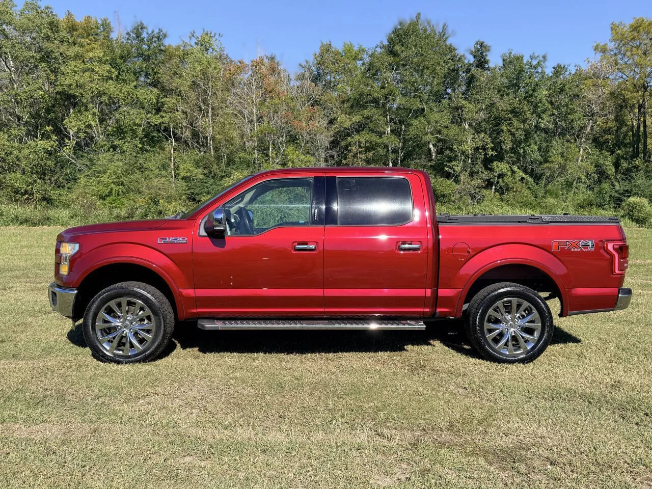 Used 2016 Red Ford Lariat 4x4 4dr SuperCrew 5.5 ft. SB image 2