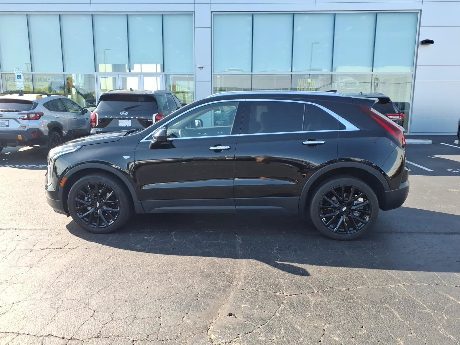 Used 2023 Stellar Black Metallic Cadillac AWD Luxury image 4