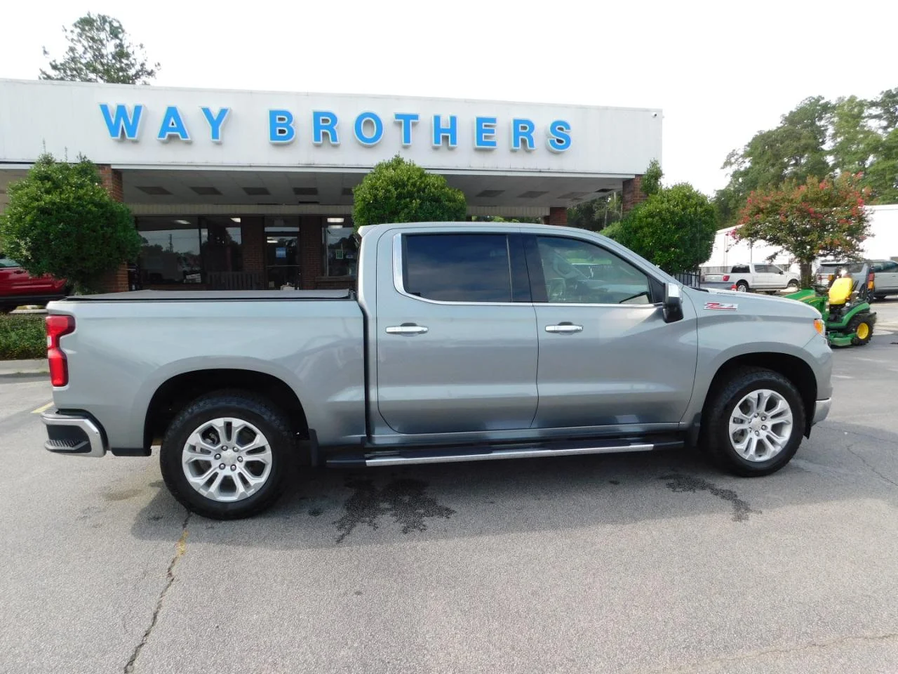 Used 2023 Silver Chevrolet 4WD CREW CAB 147 in LTZ image 1