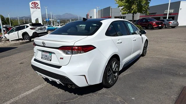 Used 2022 Black Sand Pearl Toyota SE image 4