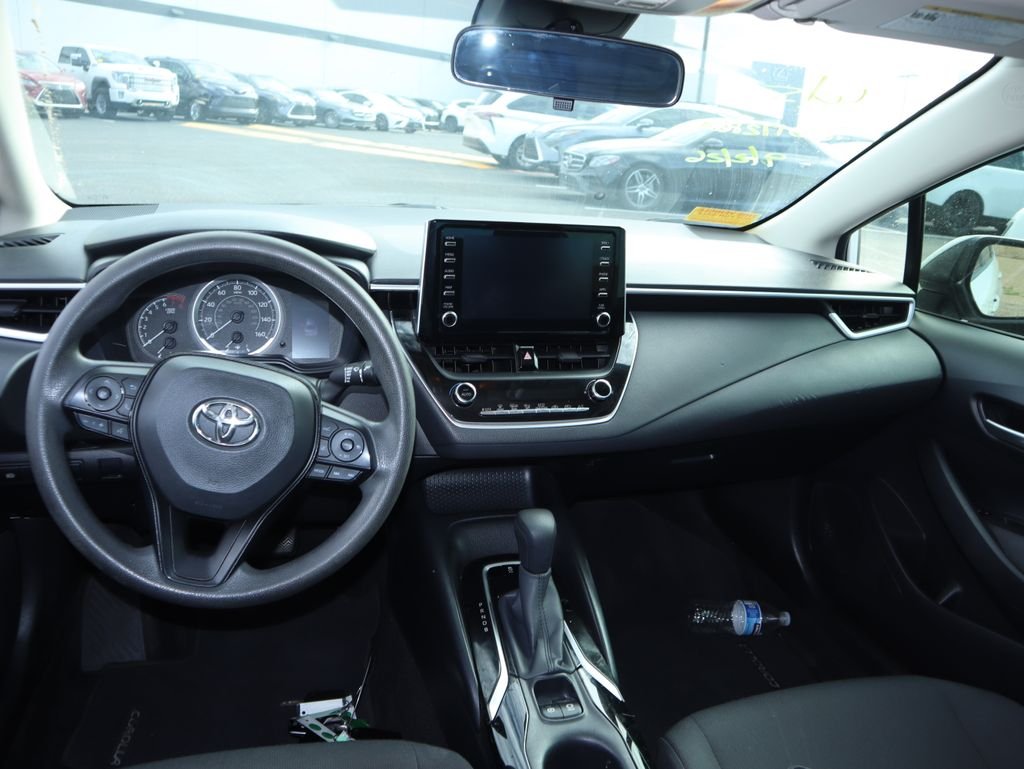 Used 2020 Super White Toyota LE image 7