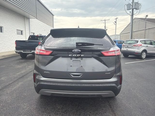Used 2024 Light Blue Clearcoat Metallic Ford SEL image 4