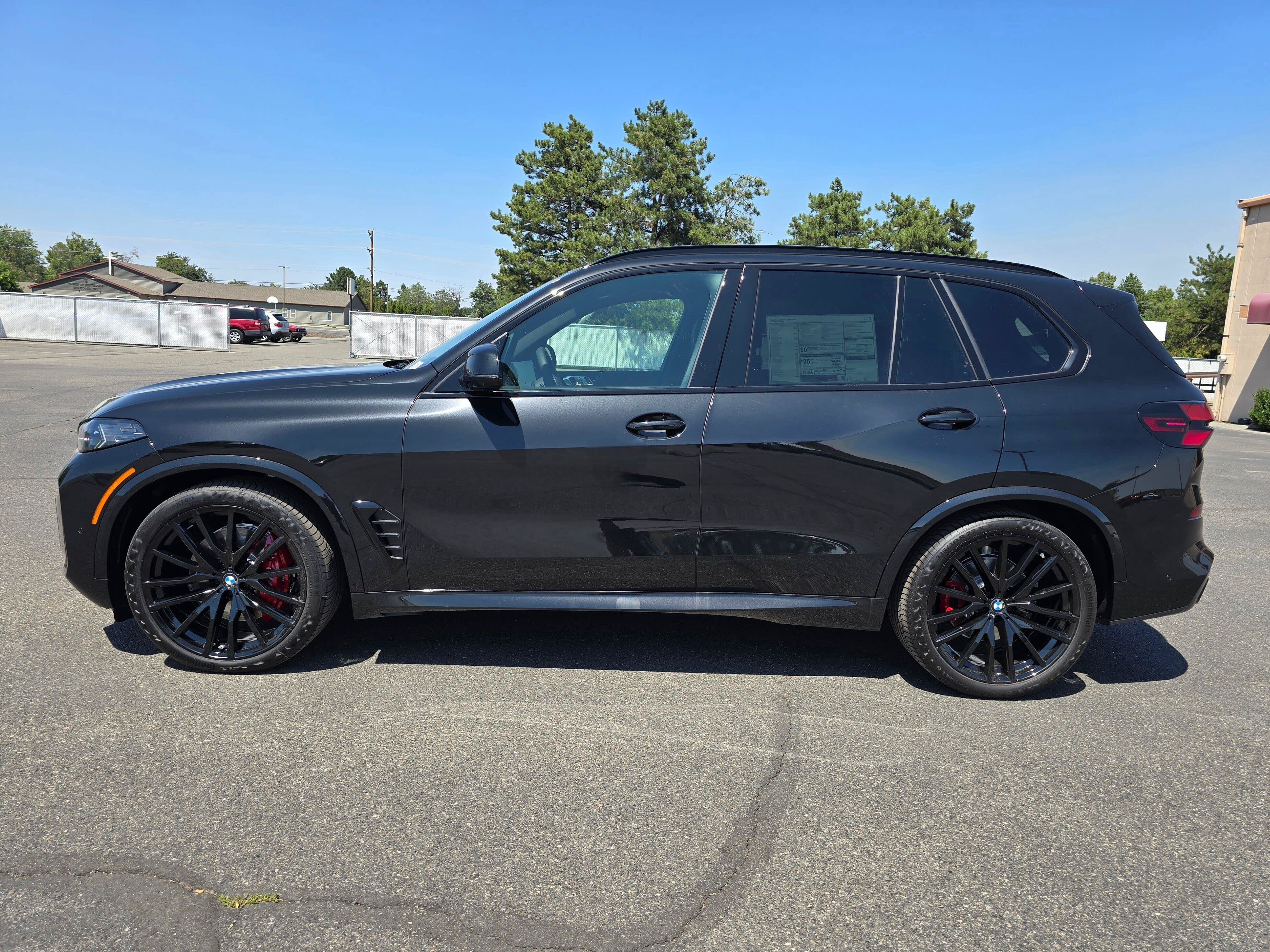 New 2026 Black Sapphire Metallic BMW xDrive40i image 3