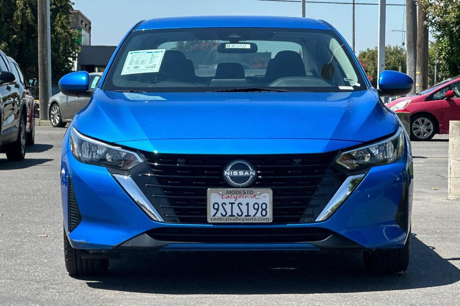 Used 2025 Electric Blue Metallic Nissan SV image 9