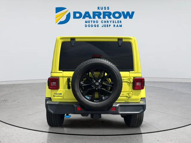 Used 2023 Yellow Jeep Sahara 4xe image 4