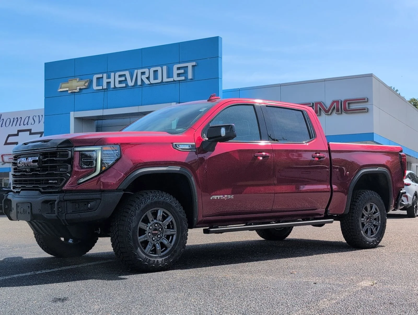 New 2026 Volcanic Red Tintcoat GMC AT4X image 1