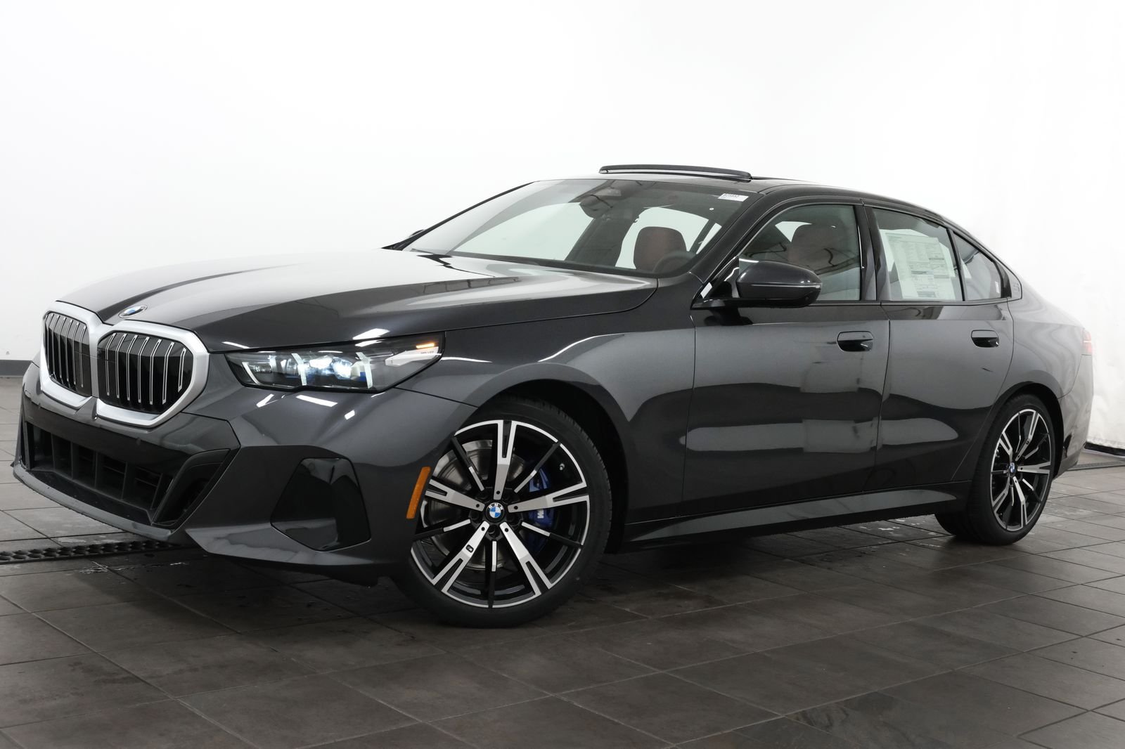 New 2027 Dark Graphite Metallic BMW 530i xDrive image 1